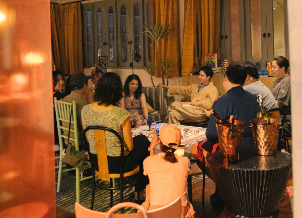 Women gathered in a collaborative space for reflection, learning, and inquiry — collective community hosted by Resolution Witch